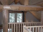 Interior of McDonagh house showing roof support and railing details